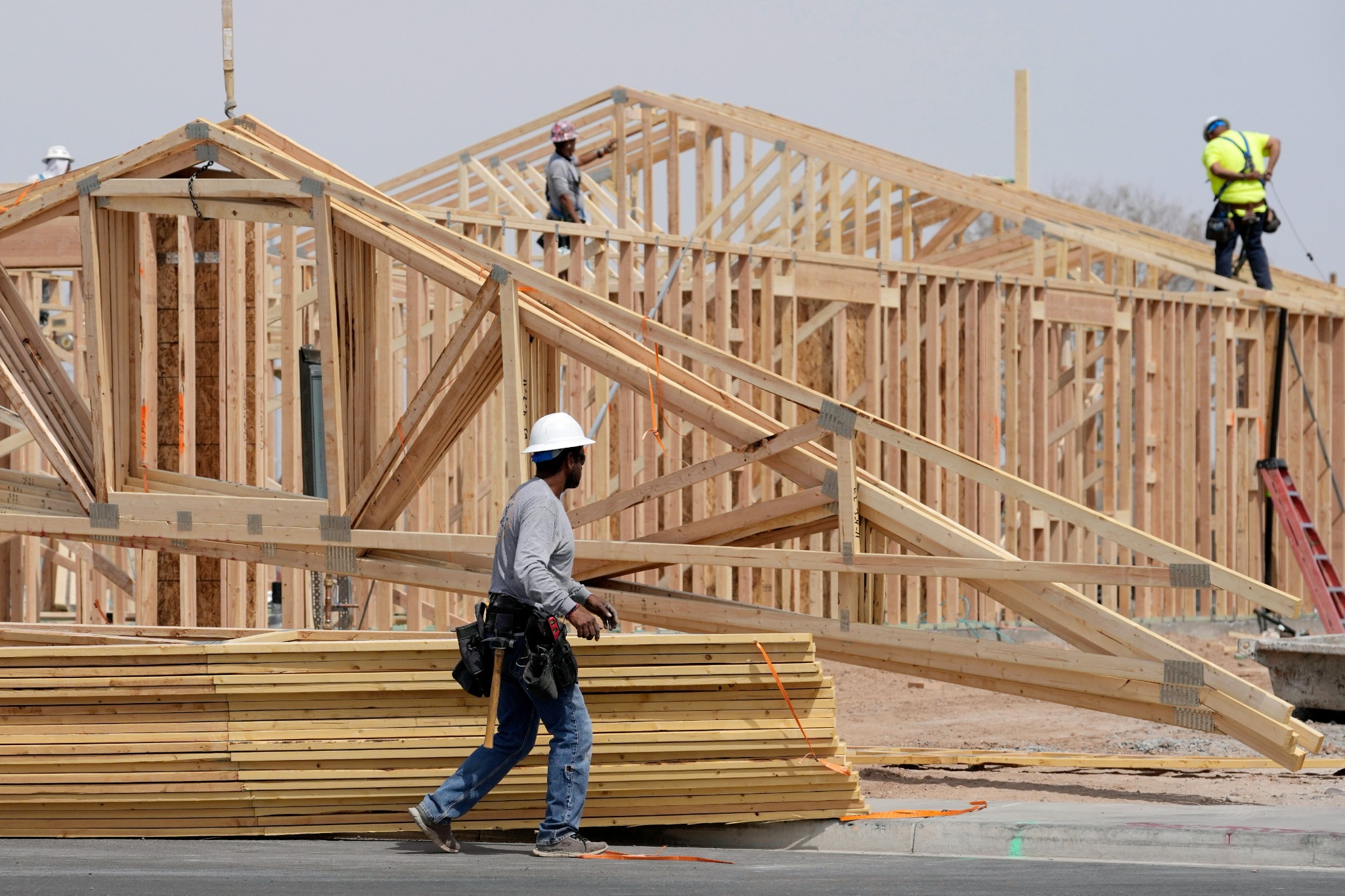 Construction crew framing a new building
